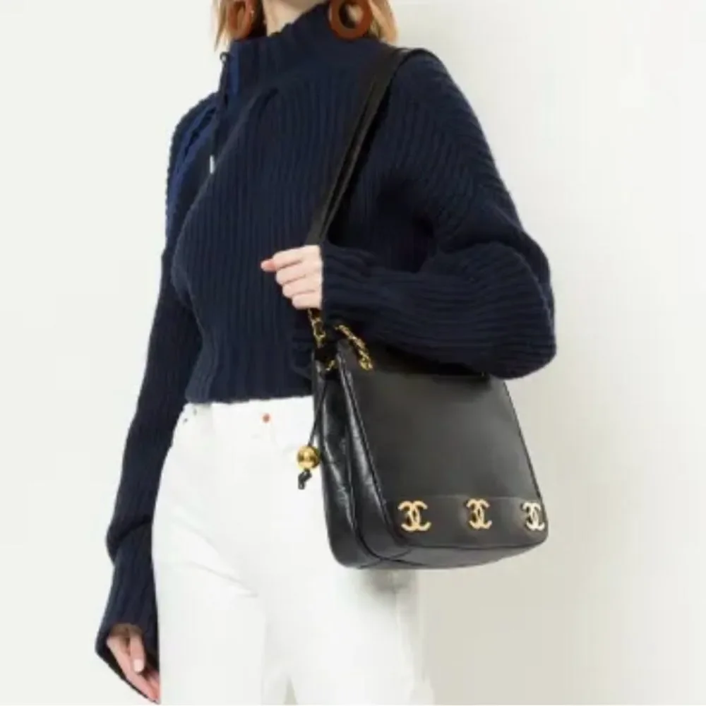 Authentic Chanel Triple CC Black/Gold Caviar Leather Chanel Shoulder Bag.